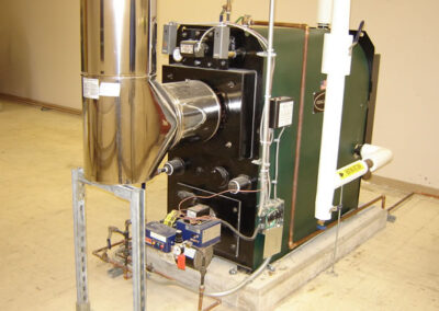 The KWO 550 boiler burns their aviation waste oil to heat the shop.